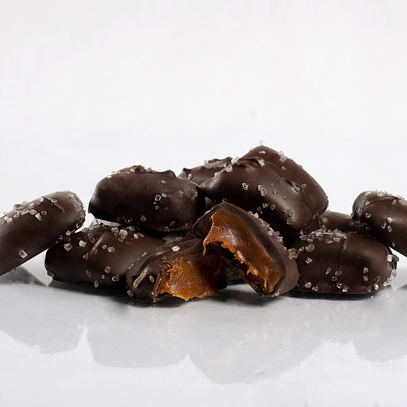 Individually Wrapped Dark Chocolate Sea Salt Caramel Lifestyle - product carousel image