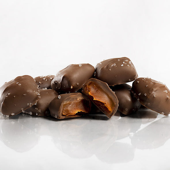 Individually Wrapped Milk Chocolate Sea Salt Caramels Group Open- product carousel image